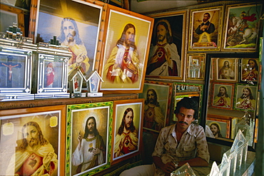 Shop selling Christian posters of Jesus to hang in South Indian Christian homes, South India, India, Asia