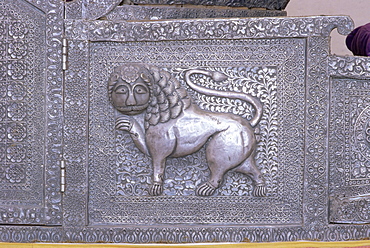 Beautiful raised silver work on panel on the side of an elephant howdah, Mehrangarh Fort Museum, Jodhpur, Rajasthan state, India, Asia