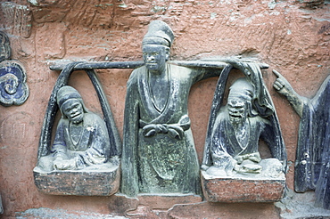 Sculpture showing son shouldering his parents in old age, Dazu Rock Carvings, UNESCO World Heritage Site, Sichuan, China, Asia