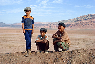 Portrait of three boys, Turpan, Xinjiang, China, Asia