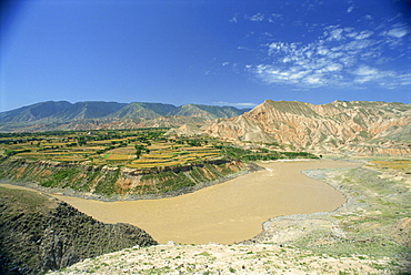 Landscape of the Yellow River, farm land and hills in Qinghai, China, Asia