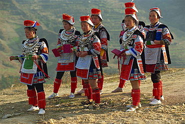 Miao girls in festival dress, Gejia, southeast Guizhou, Guizhou, China, Asia