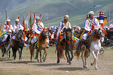 Tibetan racers, Yushu Horse Fair, Qinghai Province, China, Asia