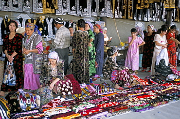 Selling traditional textiles for weddings, Urgut, Uzbekistan, Central Asia, Asia