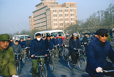 Crowds cycling to work, Changan Avenue, Beijing, China, Asia