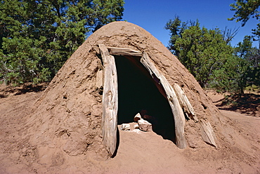 A Navajo steam bath where water is sprinkled on hot rock for steam, and with doorway closed one or two can crouch, Arizona, United States of America, North America