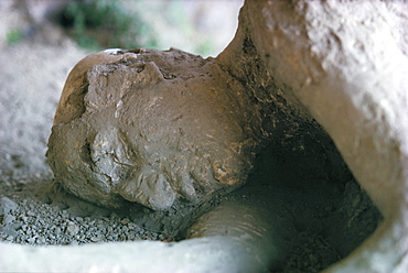 Victim of Vesuvius eruption, volcanic ash formed mould, form later revealed by injecting plaster, Pompeii, Campania, Italy, Europe