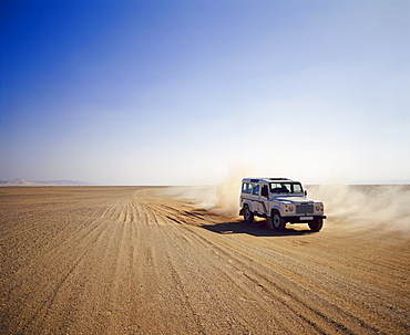 Four-wheel drive Landrover, off-roading in the desert, Algeria, Africa 