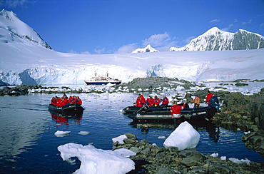 Cruise passengers on excursion by dinghy, Port Lockroy, once a Second World War British Station, now a post office, Antarctic Peninsula, Antarctica, Polar Regions