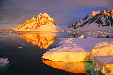 Iceberg lit by midnight sun, Antarctic Peninsula, Antarctica