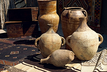 Close-up of pots, boxes and woven textiles for sale outside shop, Guadalupe Street, Sante Fe, New Mexico, United States of America, North America