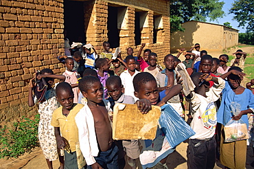 A group of children leaving the village school at Kande near Lake Malawi, Malawi, Africa