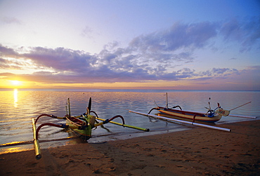 Outrigger boats at sunrise, Sanur Beach, Bali, Indonesia, Asia