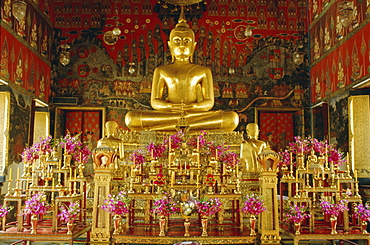 Seated Buddha statue inside Wat Phra Kaew, Bangkok, Thailand