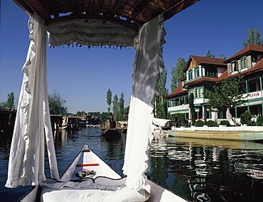 Shikara on the waterways of Srinagar, Kashmir, India, Asia