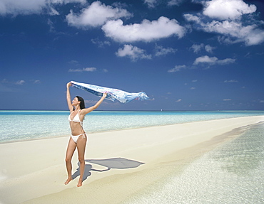 Girl on beach, Rhiveli, Maldives, Indian Ocean, Asia