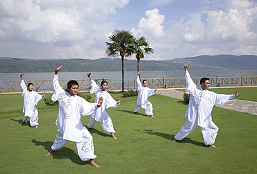 Tai Chi by the lake at the Brilliant Resort and Spa in Kunming, Yunnan Province, China, Asia