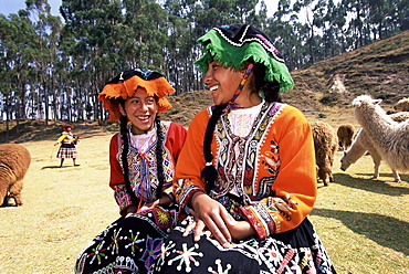 Portrait of two local Peruvian girls in traditional dress, Cuzco (Cusco), Peru, South America