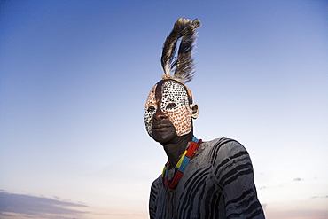 Portrait of a Karo tribesman with facial decoration imitating the spotted plumage of the guinea fowl, Omo River, Lower Omo Valley, Ethiopia, Africa