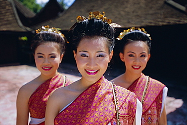 Portrait of three traditional Thai dancers, Chiang Mai, northern Thailand, Asia
