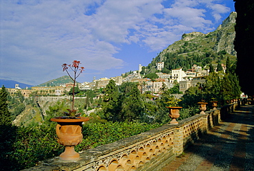 View over city from the public gardens, Taormina, Sicily, Italy, Europe