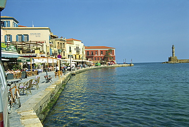 The harbour waterfront and the Venetian lighthouse, Chania, Crete, Greece, Europe