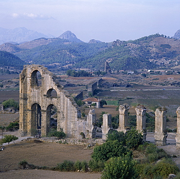 Ruins of Roman aqueduct which brought water from mountains to the city on a hill, illustrating Roman knowledge of water physics, archaeological site, Aspendos, Anatolia, Turkey, Asia Minor