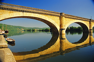 Reflections of a bridge in the River Dordogne, Mauzac, Dordogne, Aquitaine, France, Europe