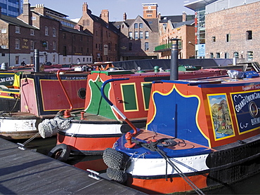 Narrow boats and barges moored at Gas Street Canal Basin, city centre, Birmingham, Midlands, England, United Kingdom, Europe