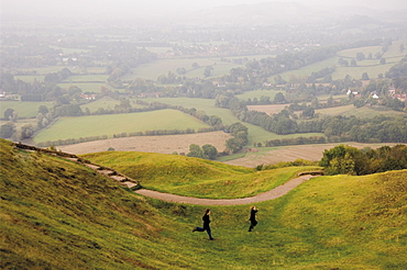 Tow children running down path, British Camp, Hereford Beacon, Malvern Hills, Herefordshire, Midlands, England, United Kingdom, Europe