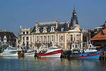 Hotel de Ville (town hall) and fishing boats at mouth of the River Touques, Trouville, Calvados, Cote Fleurie, Normandy, France, Europe