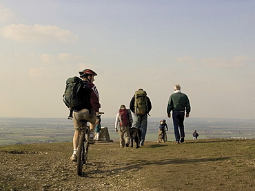 Mountain bikers and walkers, summit of the Ridgeway Path, Ivinghoe Beacon, The Chilterns, Buckinghamshire, England, United Kingdom, Europe