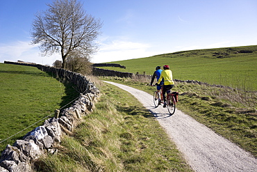 Couple on a tandem on the High Peak Trail, Peak District National Park, Derbyshire, England, United Kingdom, Europe