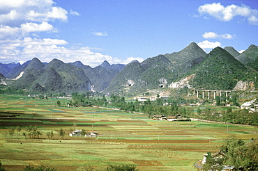 Conical limestone hills and Shanghai to Kunming Railway, Guilin, Shuicheng, Guizhou, China, Asia