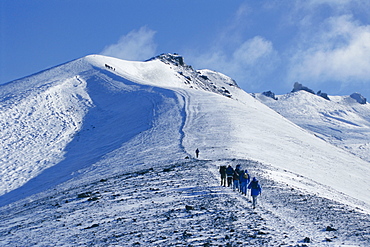 Hikers on rim of old crater, Avacha volcano, Kamchatka, East Siberia, Russia