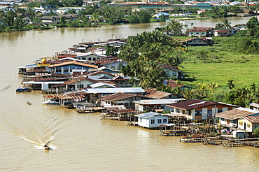 Stilt houses along Limbang River, Limbang City, Sarawak, island of Borneo, Malaysia, Southeast Asia, Asia