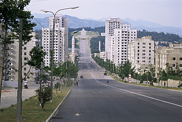 High-rise flats and over-sized street, with lack of traffic, Kaesong, North Korea, Asia