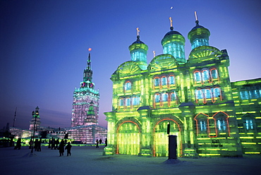 Ice buildings lit at night, Ice Lantern Festival, Bingdeng Jie, Harbin city, Heilongjiang, China, Asia