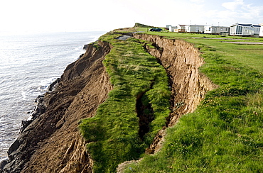 Coastal erosion with active landslips in glacial till, Aldbrough, Holderness coast, Humberside, England, United Kingdom, Europe