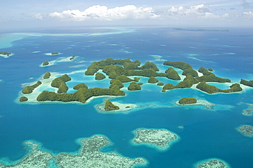 Seventy Islands (Ngerukewid Islands Wildlife Preserve), forest-covered limestone rock, protected as a Nature Reserve, so can only be seen from the air, Palau, Micronesia, Western Pacific Ocean, Pacific