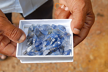 Uncut sapphires from local mines, Ratnapura morning gem market, southern Sri Lanka, Asia