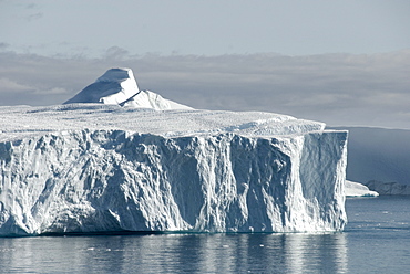 Tabular iceberg emerging from Kangia Ice Fjord, next to Ilulissat, Disko Bay, Greenland, Polar Regions