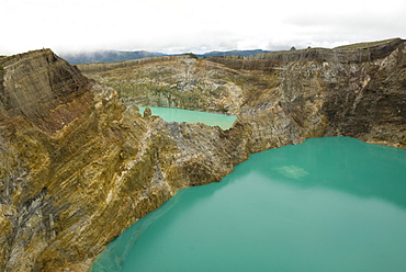 Multi-coloured crater lakes at summit of Kelimutu volcano, eastern Flores, Nusa Tenggara, Indonesia, Southeast Asia, Asia