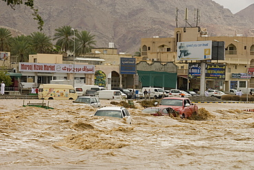 A flash flood in the wadi through the centre of town, Nizwa, Oman, Middle East 