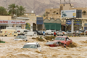 A flash flood in the wadi through the centre of town, Nizwa, Oman, Middle East 