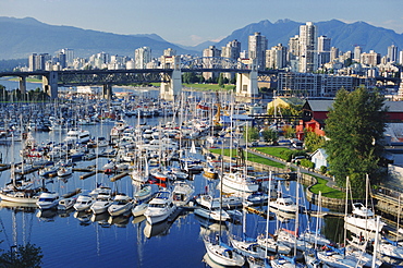 City centre seen across marina in Granville Basin, Vancouver, British Columbia, Canada