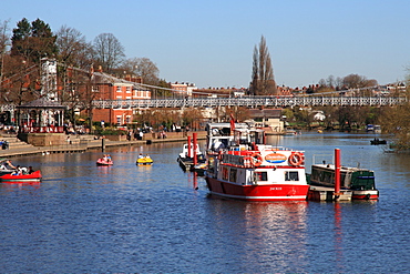 Boats and suspension bridge over the River Dee, Chester, Cheshire, England, United Kingdom, Europe