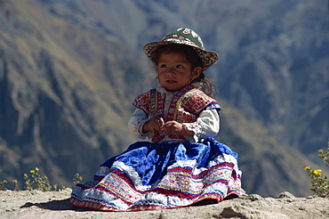 Little girl in traditional dress, Colca Canyon, Peru, South America