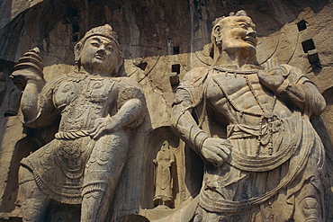 Statues carved in the rock at the Longmen Buddhist caves at Luoyang, UNESCO World Heritage Site, Hunan Province, China, Asia