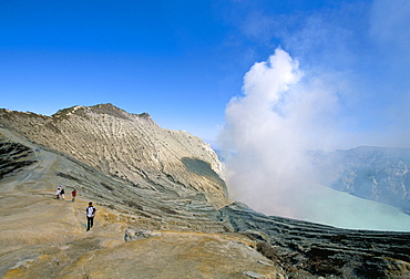 Tourists trekking, Sulphur Lake, Kawah Ijen, Ijen Plateau, island of Java, Indonesia, Southeast Asia, Asia